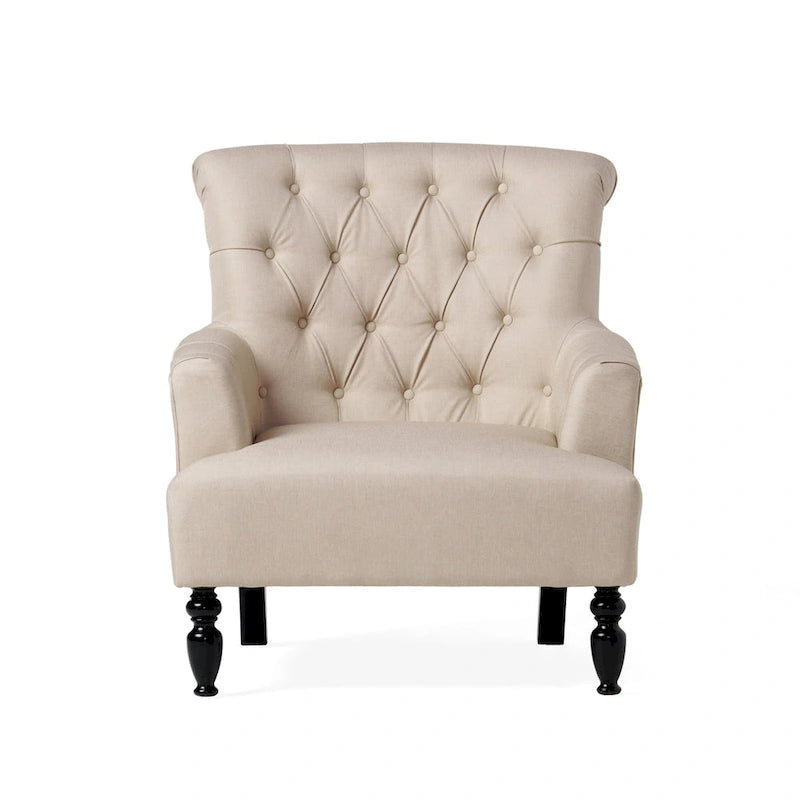 Fauteuil club capitonné à dossier roulé